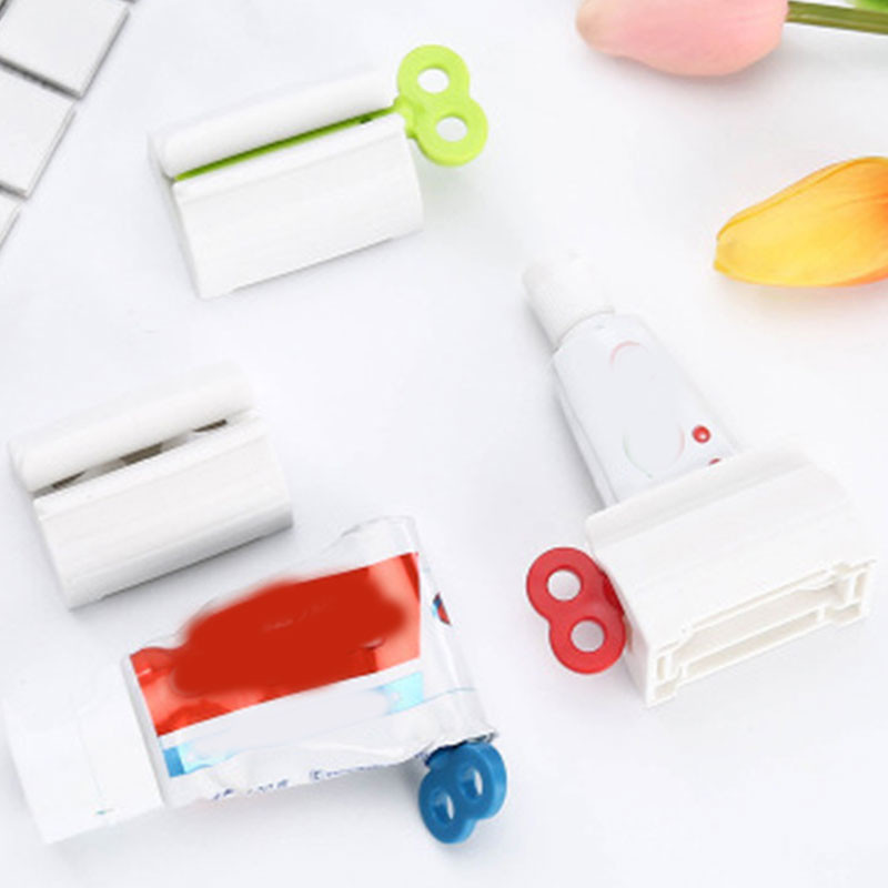 Stezaljka za pastu za zube Uređaj za kotrljanje paste za zube u kućanstvu Držač tube za doziranje lijene paste za zube Cjedilo Preša Kupaonski pribor