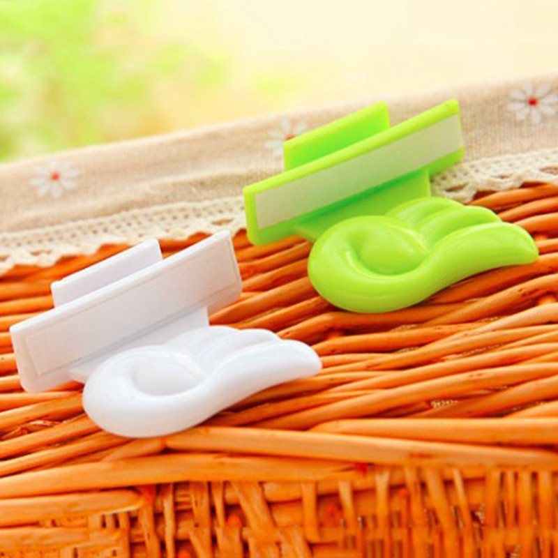 Uređaj za podizanje Glatki držač Čisto slatko krilo Izdržljiva higijenska ručna oprema za sjedalo Podizač WC navlake Preklopna školjka 2 boje