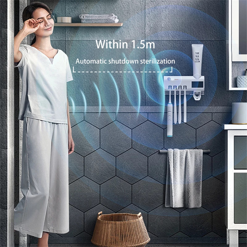 Zobu birstes UV sterilizācijas turētāji Pie sienas stiprināmi elektriskie zobu pastas spiedes dozators Vannas istabas piederumi Saules uzlāde