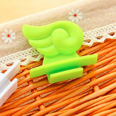 Uređaj za podizanje u 2 boje Glatki držač Čisto slatko krilo Izdržljiva higijenska ručna oprema za sjedalo Podizač WC poklopca Preklopna školjka