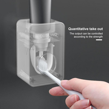 Държач за четка за зъби Автоматичен дозатор за паста за зъби Прахоустойчива лепкава засмукваща монтирана на стена изстисквачка за паста за зъби за баня