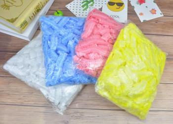 100 Καπέλα ντους μιας χρήσης Αδιάβροχα σκουφάκια μπάνιου για ενήλικες Πλαστικά καλύμματα κεφαλής για άνδρες και γυναίκες