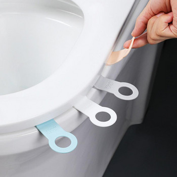 για το σπίτι Ring-pull Design Ανυψωτικό καπάκι τουαλέτας Λαστιχένιο Αντι-βρώμικο για αποφυγή Επικοινωνία Κάλυμμα καθίσματος τουαλέτας Εργαλείο αναδιπλούμενου εργαλείου μπάνιου