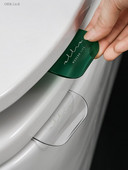 obkind Sadzīves caurspīdīgs tualetes roktura pārsega noņēmējs tualetes pārsega noņēmējs pret netīro sanitāro tualetes pārsega gredzenu attaisāmais