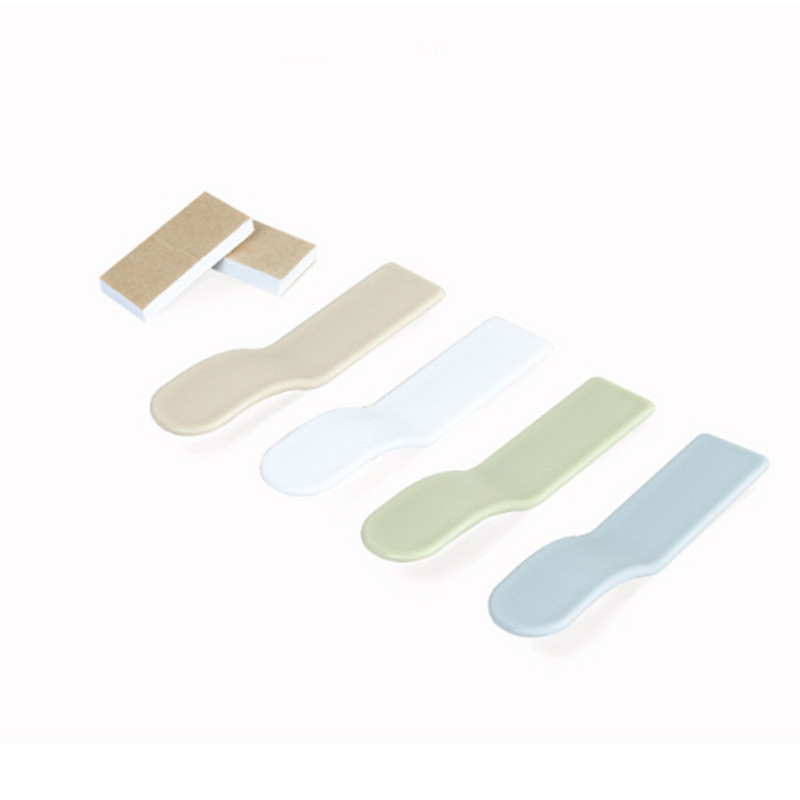 Plastikust määrdumisvastane WC-istme kate Tõstja istmekatte kaane käepideme kleebis tõsteseade reisimiseks koju Vannitoa tarvikud