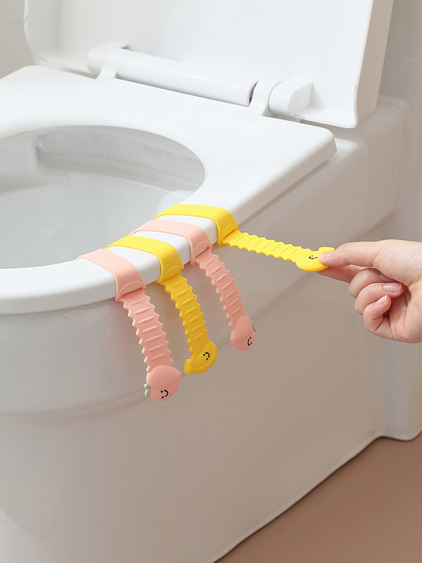 Karikatūras silikona tualetes vāka pacēlājs, neslīdošs sprādzes dizains, mīksts rokturis, netīrumus izturīgs tualetes sēdekļa aksesuāri