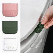 Pārnēsājams Ziemeļvalstu caurspīdīgs tualetes sēdekļa pacēlājs tualetes pacelšanas ierīce Izvairieties pieskarties tualetes vāka roktura tualetes piederumiem