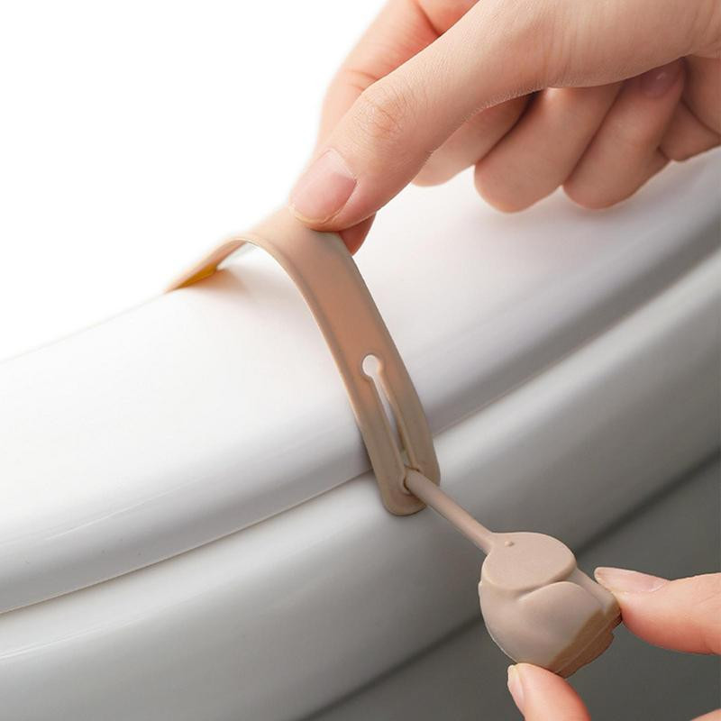 Tualetes sēdekļa rokturis Silikona tualetes pārsega vāka rokturis vannas istabas tualetes sēdekļa pacēlājam Izvairieties pieskarties tualetes sēdekļa turētāja pacelšanas instrumentiem