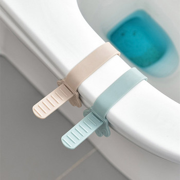 Πλαστικό ανυψωτικό καθίσματος τουαλέτας Συσκευή ανύψωσης τουαλέτας Αποφύγετε τα βακτήρια αφής Λαβή καλύμματος Αντι-βρώμικο καπάκι μπάνιου Ανύψωση αξεσουάρ WC