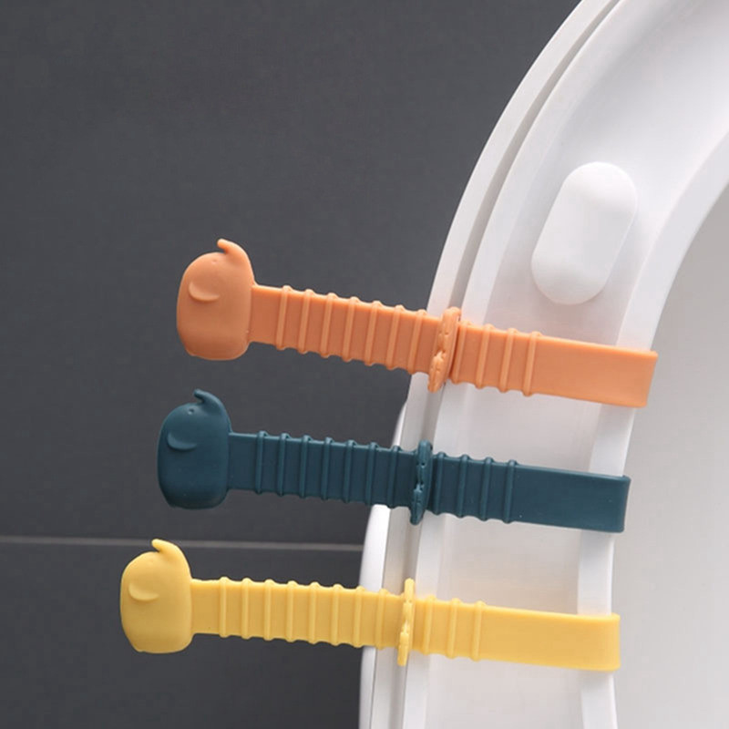 Tualetes vāka pacēlājs Silikona sēdekļa paceļamā lente Vannas istabas piederumi Atkārtoti lietojami, izturīgi mājas biroja viesnīcām