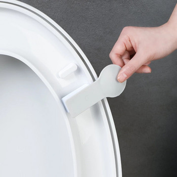 Повдигач на капака на тоалетната Дръжка на тоалетната Домакинска защита срещу замърсяване Незамърсени ръце Капак за тоалетна Откриване Обръщаща се дръжка