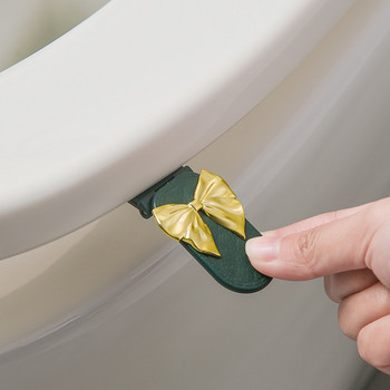 1 τεμ. Κάλυμμα Τουαλέτας με φιόγκο σιλικόνης Ανυψωτικό καπάκι τουαλέτας Λαβή οικιακού μπάνιου Ανυψωτικό πτερύγιο χωρίς βρώμικη λαβή Artifact Lifter καπακιού