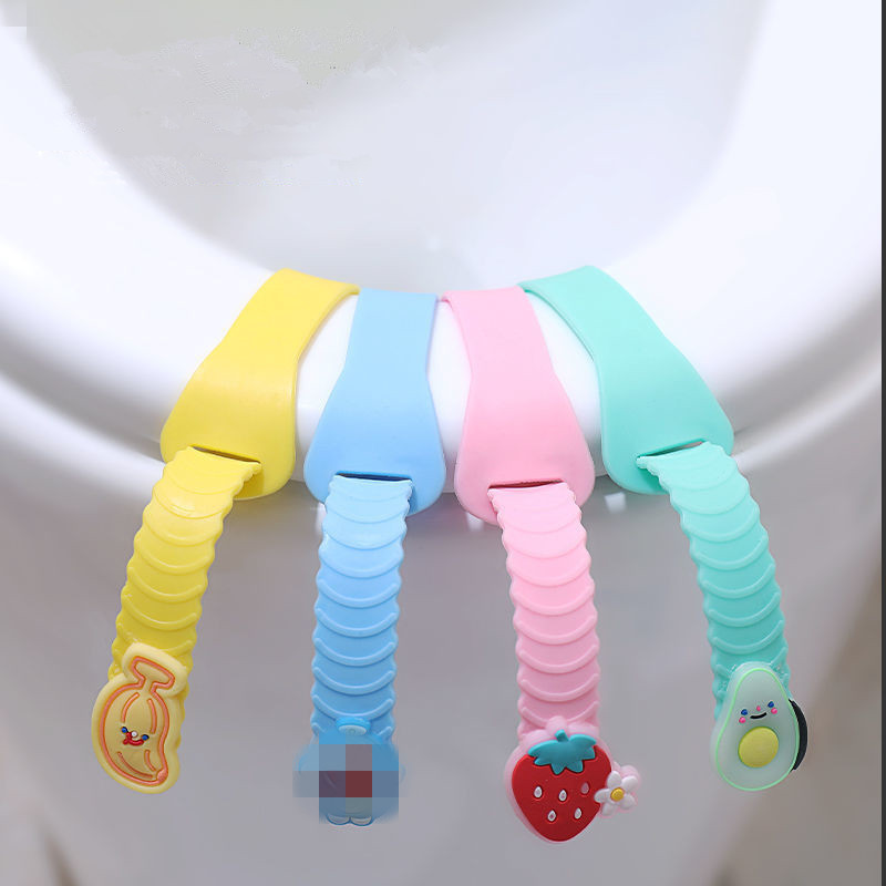 2 gab Cute Fruit tualetes sēdekļa pārsega pacēlājs silikona sanitārais Closestool sēdekļa pārsega pacelšanas rokturis ceļojumu vannas istabas pacelšanas ierīcei