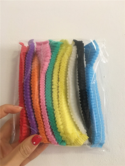 Karstā izpārdošana 10 gab. Neaustas vienreizējās lietošanas dušas cepures, kroku pretputekļu cepures sievietēm vīriešiem vīriešu vannas cepures spa frizētavā Skaistumkopšanas aksesuāri