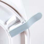 Mājas tīrīšanas rīki Tualetes sēdekļa turētājs Pacēlājs Sanitārais Closestool Sēdekļa pārvalks Lift Rokturis Sēdekļa pārsega pacēlājs Vannas istabas piederumi