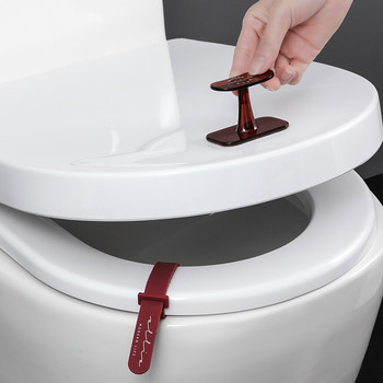 Творчески повдигач на капака на тоалетната Дръжка на домакинската тоалетна Повдигане на седалката Избягвайте директното докосване на микроби WC аксесоари