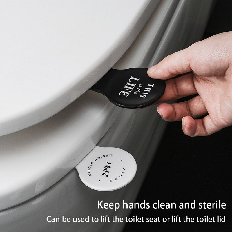 Tualetes sēdekļa pacēlājs vannas istabas pacelšanas roktura pārsegs pacelšanas turētājs noņemams mazgājams pārnēsājams mājsaimniecības piederums ceļojumiem