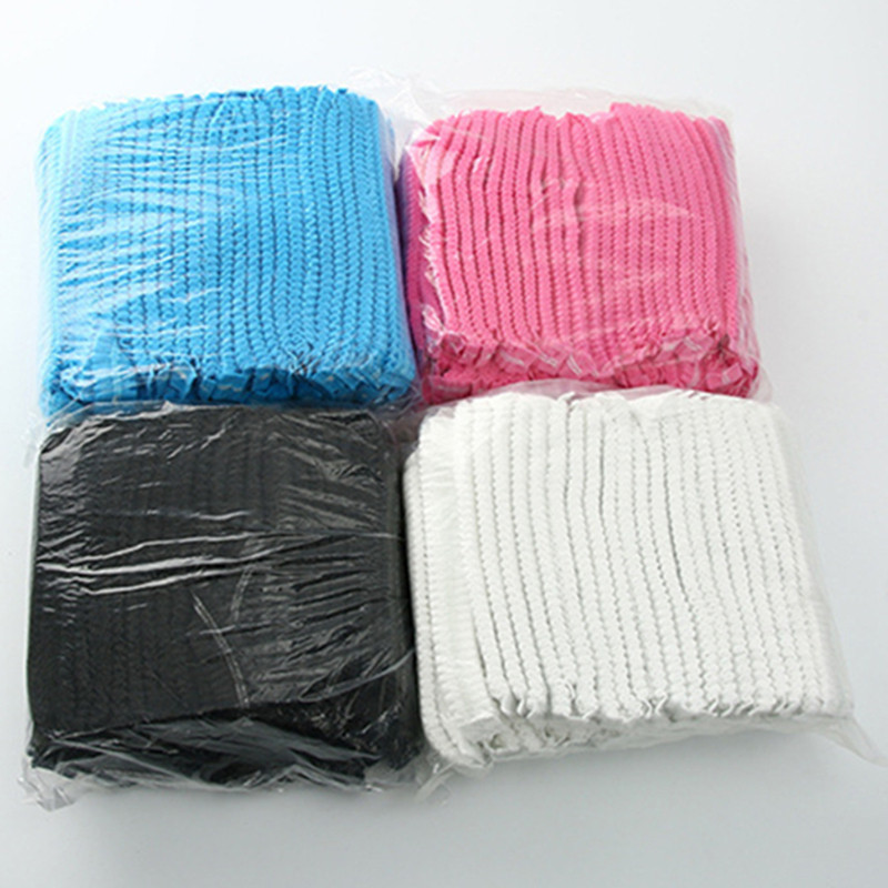 100 gab. Neausta vienreizlietojama elastīga kroku putekļu cepure sievietēm vīriešu dušas cepures spa matu cepurēm Salons Vannas istaba Frizētava viesnīca