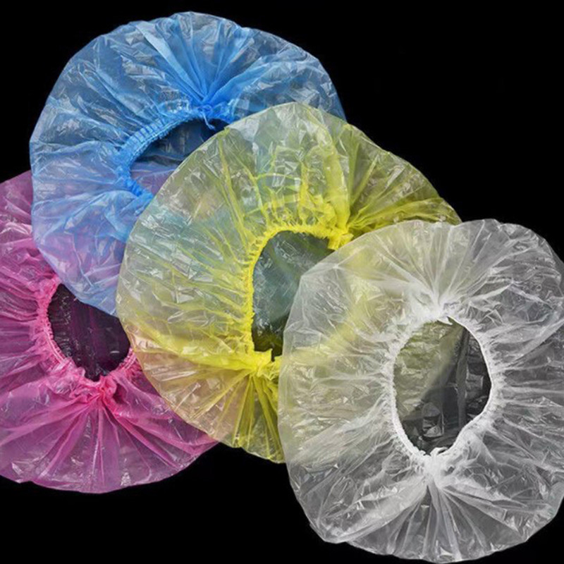 100db eldobható zuhanysapkák fürdőkád vízálló felnőtt hajszárító sapkák porálló műanyag fejfedők férfiaknak és nőknek