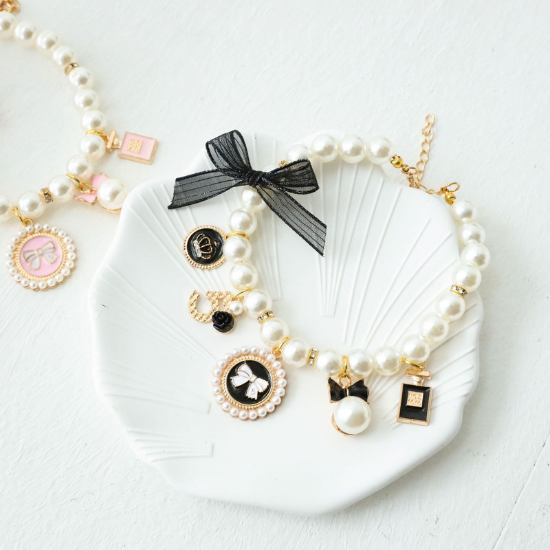 Mājdzīvnieku pērļu kaklasiksna suns princese priekšgala kaklarota kaķu rotaslietas jaukas apkakles kucēnu aksesuāri suņu ķēde čivavas kāzu rotaslietas