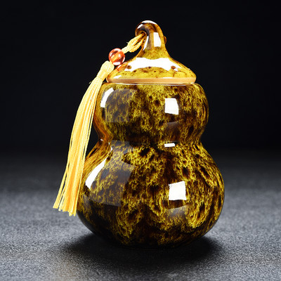 Ķirbju mājdzīvnieku urna — mājdzīvnieki, kas aprakti keramikas tvertnes urnās vai iekšā