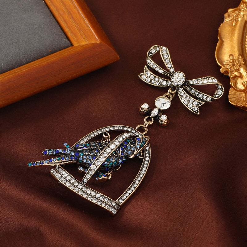 muylinda Pretjerani broš s kavezom za ptice od kamenčića Luksuzni kristalni veliki broševi za žene Muškarci Dizajnirana odjeća Nakit Poklon