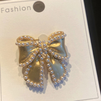 Нови висококачествени игли за брошка с перлена лък за жени Златен цвят щифтове с ревери с бантик Палто Жилетка Значка Модни бижута за сватбено тържество