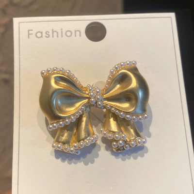 Jaunas augstas kvalitātes pērļu loku saktas piespraudes sievietēm zelta krāsā Bowknot atloka piespraudes Mētelis jaciņa nozīmīte Modes kāzu ballīšu rotaslietas