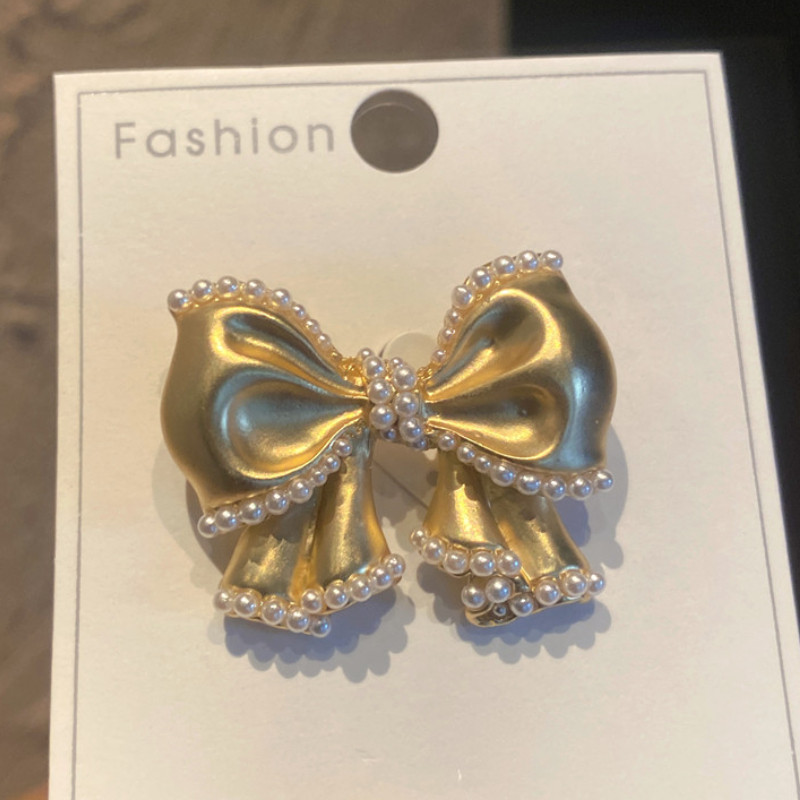 Jaunas augstas kvalitātes pērļu loku saktas piespraudes sievietēm zelta krāsā Bowknot atloka piespraudes Mētelis jaciņa nozīmīte Modes kāzu ballīšu rotaslietas