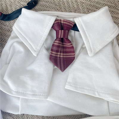 Koledžas stila mājdzīvnieks JK krekls tauriņš Kaķu apkakle Skolas nozīmīte Piespraude Kaķis Bišons Rotaļu apģērbu aksesuāri Kaķēnu aksesuāri