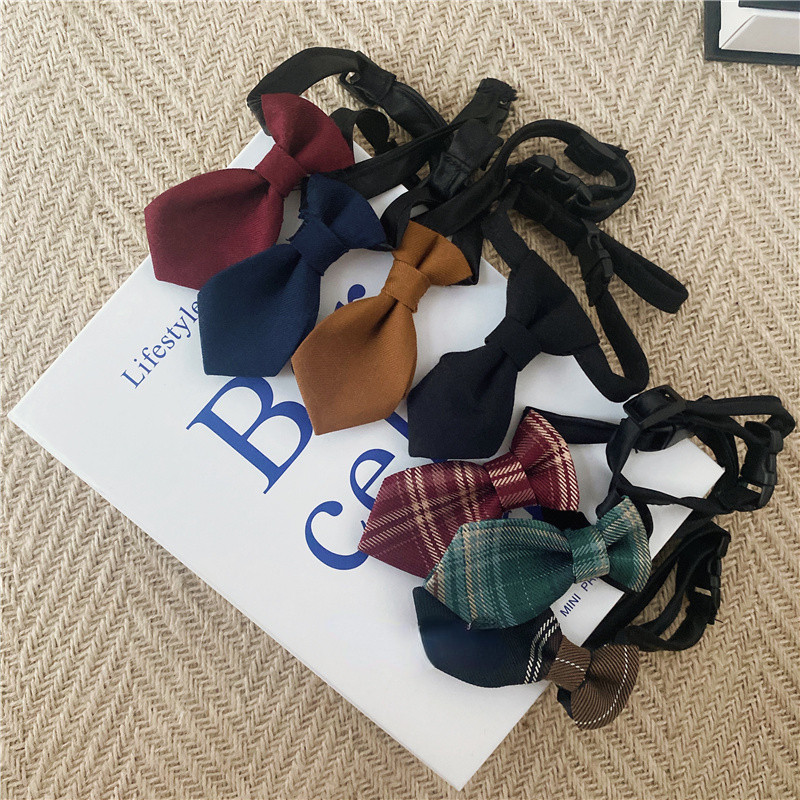 Koledžas stila mājdzīvnieks JK krekls tauriņš Kaķu apkakle Skolas nozīmīte Piespraude Kaķis Bišons Rotaļu apģērbu aksesuāri Kaķēnu aksesuāri