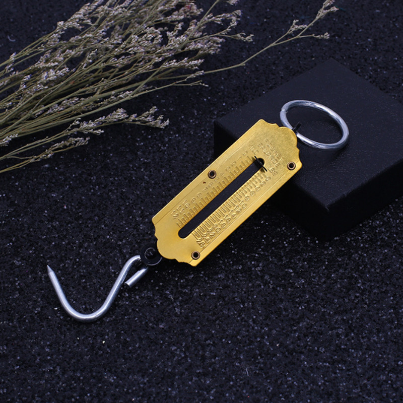 12 kg 25 kg 50 kg 100 kg 150 kg Prtljažna opružna vaga Ribolovna putna vaga Mehanička viseća vaga s udicom Prijenosno vaganje