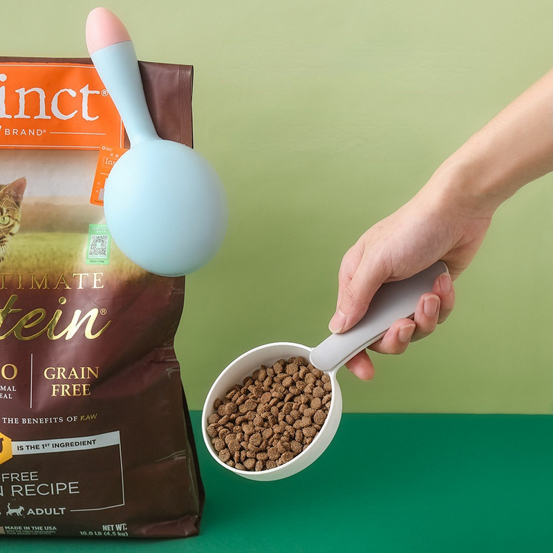 Multifunktsionaalne koeratoit kassitoidu labidas lusikas söötmislusikas suletud kotiklambriga Loominguline mõõtetops kumer disain, kergesti puhastatav