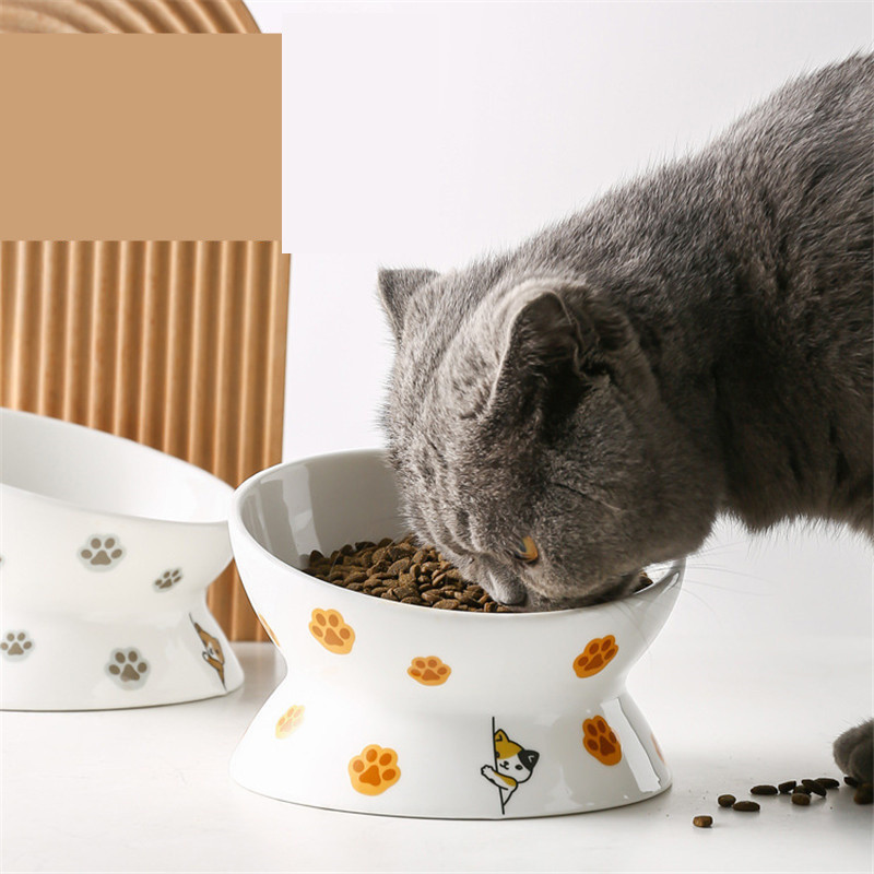 Jauna multfilmas lolojumdzīvnieku barotavas bļoda jaukas formas ar augstu pēdu, ar vienu muti neslīdošas keramikas suņu barības bļoda kaķu barības lolojumdzīvnieku produkti Dzeramā bļoda