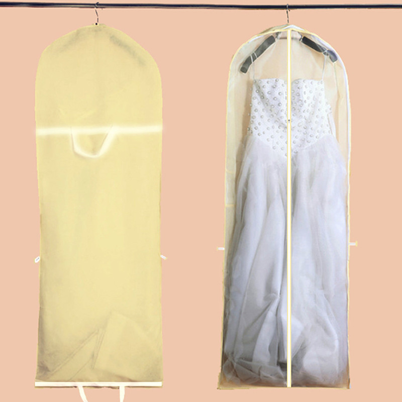 Neausta kāzu kleita, putekļu pārklājs, apģērbu uzglabāšanas soma, salokāma divējāda lietojuma rokassomiņa.