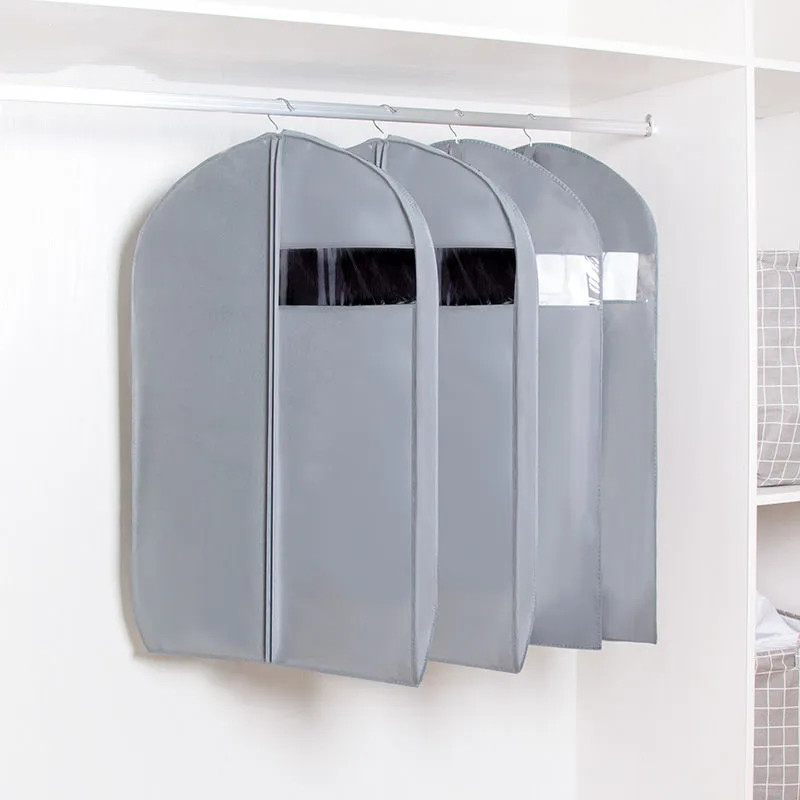 Elpojošs neausto stereoapģērbu putekļu pārsegs mājas drēbju skapis mētelis vienkrāsains putekļu necaurlaidīgs piekarināms maiss dūnu jakas uzglabāšanai