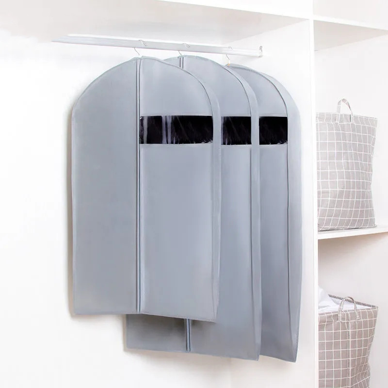 Elpojošs neausto stereoapģērbu putekļu pārsegs mājas drēbju skapis mētelis vienkrāsains putekļu necaurlaidīgs piekarināms maiss dūnu jakas uzglabāšanai