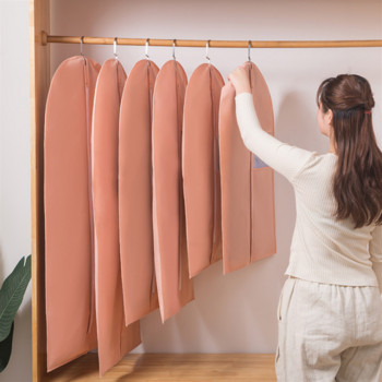 1 τεμάχιο μη υφασμένο ύφασμα Ρούχα Κάλυμμα για τη σκόνη Φόρεμα φόρεμα Τσάντα σκόνης Μοντέρνο μονόχρωμο κοστούμι Παλτό Τσάντες αποθήκευσης Τύπος κρεμαστό