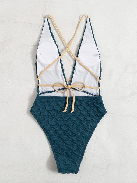 Sieviešu peldkostīms ar V-veida kakla izgriezumu un saitēm