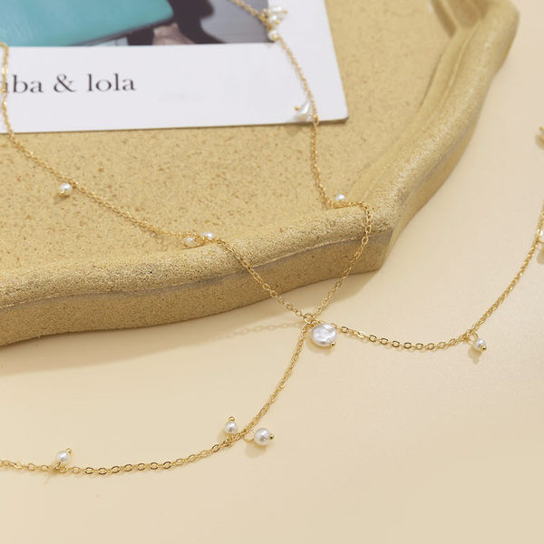 Sieviešu ķermeņa rotaslietas ar pērlēm