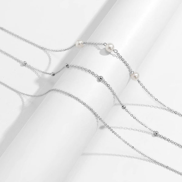 Modes sieviešu vidukļa rotaslietas ar pērlēm