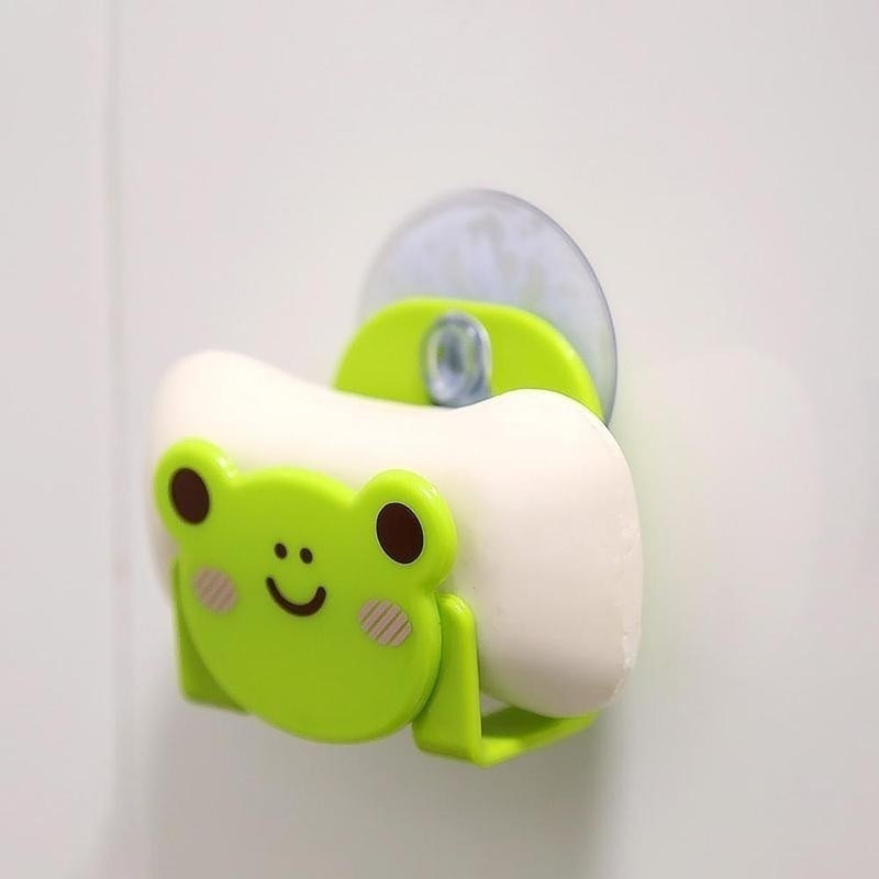 Daudzfunkcionāls multfilmu virtuves tīrīšanas sūklis, sūkšanas sienas statīvs, izlietņu plaukti, sūcēju gružu plaukti mājas piederumi