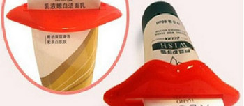Ново многофункционално екструдиране Creative Червени устни Устройство за изстискване на паста за зъби Паста за зъби Гелове Крем Лосион Изстисквачка Щипка за паста за зъби