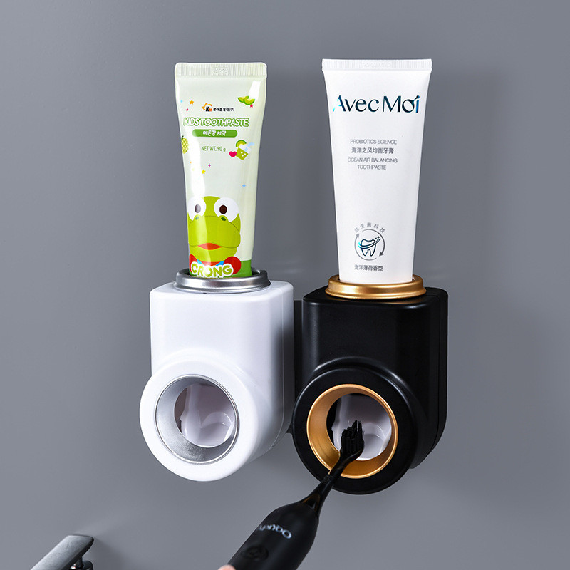 Automātiskās zobu pastas spiedes dozators sienas stiprinājums Bez caurumojuma, putekļu necaurlaidīgs zobu birstes turētājs Glabāšanas statīvs Vannas istabas piederumi