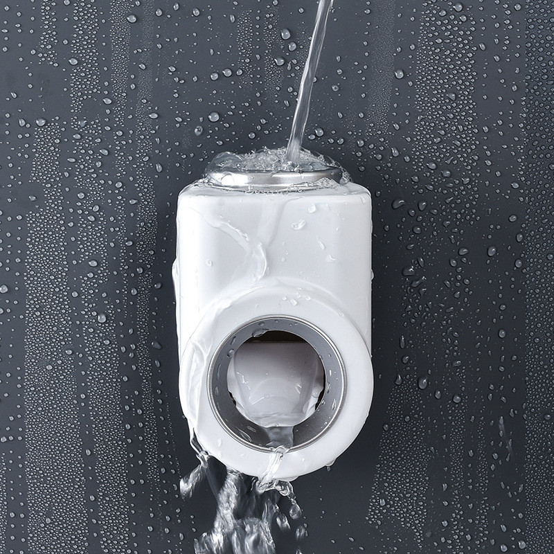 Automātiskās zobu pastas spiedes dozators sienas stiprinājums Bez caurumojuma, putekļu necaurlaidīgs zobu birstes turētājs Glabāšanas statīvs Vannas istabas piederumi