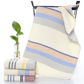 Mīksts kokvilnas vafeļu dvielis pieaugušajiem spēcīgas sūkšanas šūnu dvielis vannas dvielis pūkains cieši ādas režģa marle