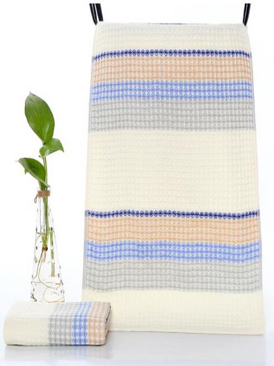 Mīksts kokvilnas vafeļu dvielis pieaugušajiem spēcīgas sūkšanas šūnu dvielis vannas dvielis pūkains cieši ādas režģa marle