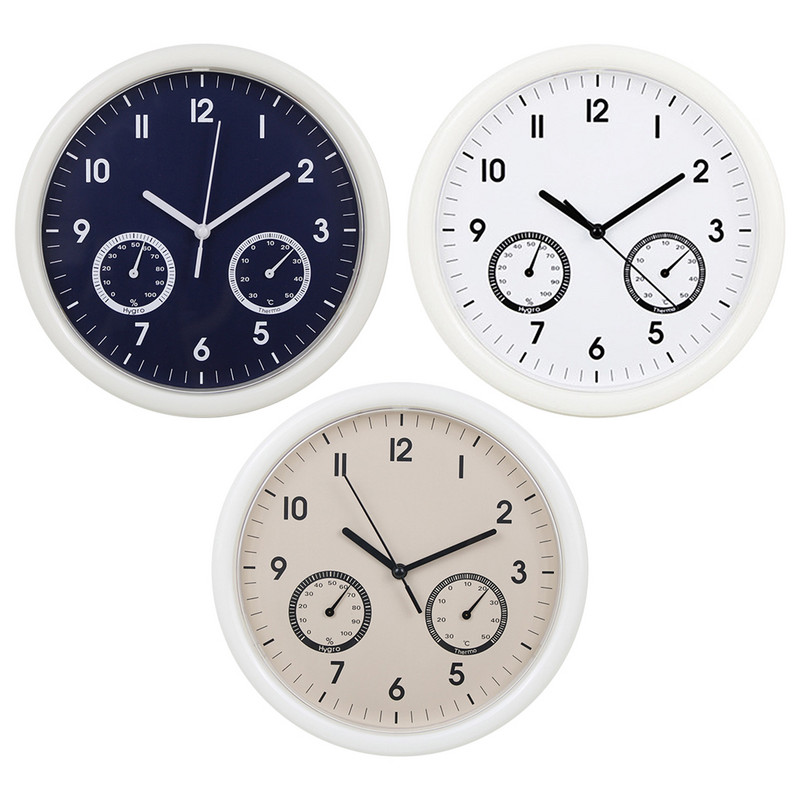 Kluss sienas pulkstenis ar termometra un higrometra displeju, kvarca slaucīšanas akumulatoru, kas darbojas mājās, birojā