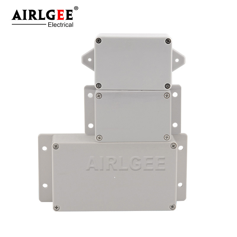 Pie sienas stiprināmi āra pelēki plastmasas korpusi, pielāgoti IP65 ABS ūdensnecaurlaidīga elektriskā sadales kārba vai nu auss elektriskā projekta kaste