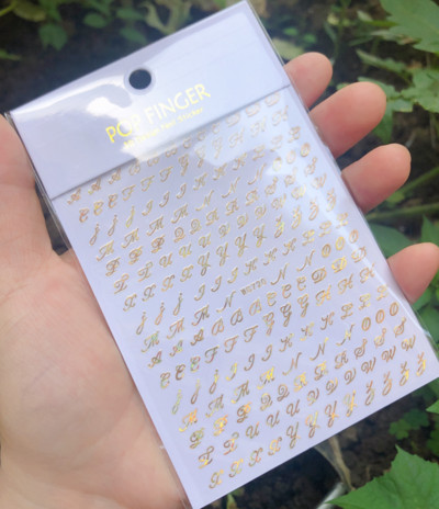 Fekete fehér betűkkel körömdíszítő matrica absztrakt arccímke csúszkák körömdíszítéshez barkácsolás Word Design UV gél varázslatok
